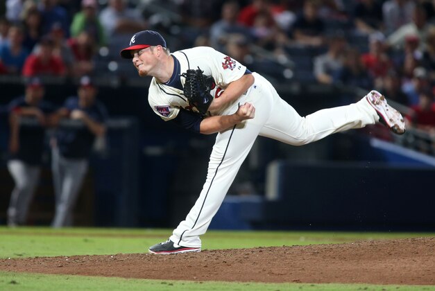 Atlanta Braves relief pitcher Craig Kimbrel (46) delivers in the ninth inning of their baseball game against the Washington Nationals in a baseball game on Saturday, April 12, 2014, in Atlanta. Atlanta won 6-3. (AP Photo/Jason Getz)