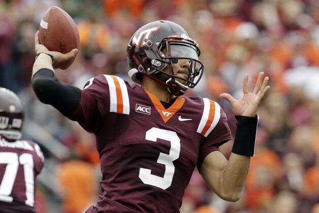 Virginia Tech quarterback Logan Thomas (3) tosses a pass during the first half of an NCAA college football game against Pittsburgh in Blacksburg, Va., Saturday, Oct. 12, 2013.  (AP Photo/Steve Helber)