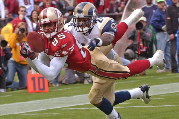 San Francisco 49ers wide receiver Brandon Lloyd catches a touchdown pass in front of St. Louis Rams cornerback DaeJuan Groce in the second quarter on Sunday, Nov. 2, 2003 in San Francisco. (AP Photo/Paul Sakumas) San Francisco 49ers wide receiver Brandon Lloyd catches a touchdown pass in front of St. Louis Rams cornerback DaeJuan Groce in the second quarter on Sunday, Nov. 2, 2003 in San Francisco. (AP Photo/Paul Sakumas)