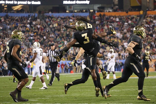 GLENDALE, AZ - JANUARY 01:  Demetri Goodson #3 of the Baylor Bears celebrates with teammates after his second quarter interception against the UCF Knights during the Tostitos Fiesta Bowl at University of Phoenix Stadium on January 1, 2014 in Glendale, Arizona.  (Photo by Christian Petersen/Getty Images)