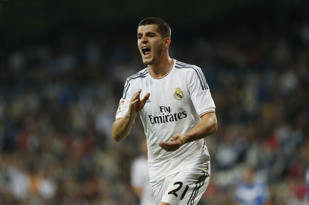 Real's Alvaro Morata celebrates his goal during a Spanish La Liga soccer match between Real Madrid and Almeria at the Santiago Bernabeu  stadium in Madrid, Spain, Saturday, April 12, 2014. (AP Photo/Andres Kudacki)