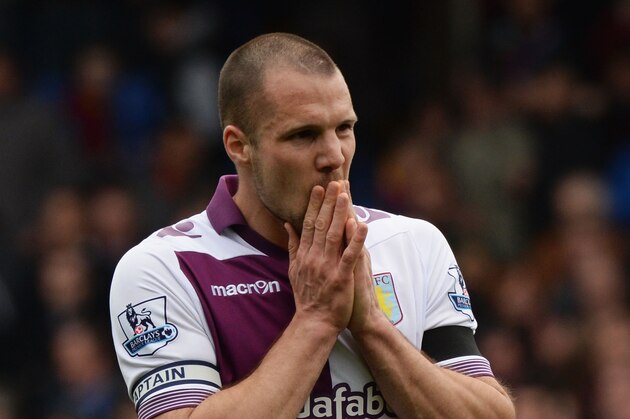 LONDON, ENGLAND - APRIL 12:  Ron Vlaar of Aston Villa reacts after defeat in the Barclays Premier League match between Crystal Palace and Aston Villa at Selhurst Park on April 12, 2014 in London, England.  (Photo by Tony Marshall/Getty Images)