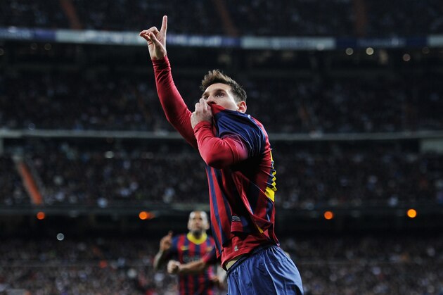 MADRID, SPAIN - MARCH 23:  Lionel Messi of Barcelona celebrates scoring his team's fourth goal during the La Liga match between Real Madrid CF and FC Barcelona at the Bernabeu on March 23, 2014 in Madrid, Spain.  (Photo by Denis Doyle/Getty Images)