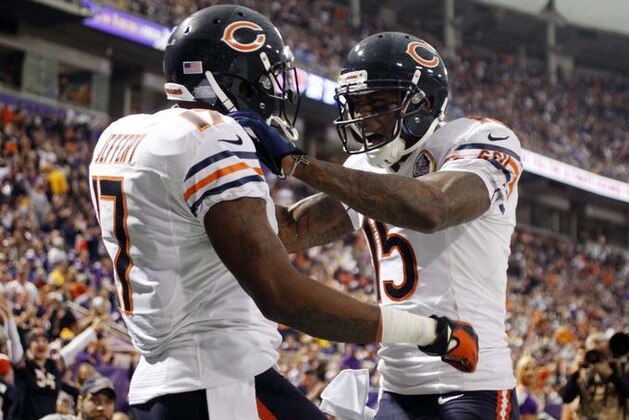 Dec 9, 2012; Minneapolis, MN, USA; Chicago Bears wide receiver Alshon Jeffery (17) celebrates his touchdown against the Minnesota Vikings with wide receiver Brandon Marshall (15) in the second quarter at the Metrodome. The Vikings win 24-14. Mandatory Credit: Bruce Kluckhohn-USA TODAY Sports