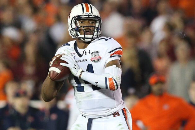 Jan 6, 2014; Pasadena, CA, USA; Auburn Tigers quarterback Nick Marshall (14) throws in the pocket against the Florida State Seminoles during the first half of the 2014 BCS National Championship game at the Rose Bowl. Mandatory Credit: Matthew Emmons-USA TODAY Sports Jan 6, 2014; Pasadena, CA, USA; Auburn Tigers quarterback Nick Marshall (14) throws in the pocket against the Florida State Seminoles during the first half of the 2014 BCS National Championship game at the Rose Bowl. Mandatory Credit: Matthew Emmons-USA TODAY Sports