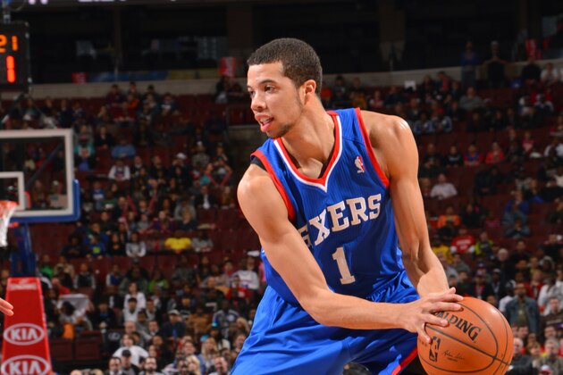 PHILADELPHIA, PA - APRIL 5: Michael Carter-Williams #1 of the Philadelphia 76ers looks to make a play with the ball during the game against the Brooklyn Nets at the Wells Fargo Center on April 5, 2014 in Philadelphia, Pennsylvania. NOTE TO USER: User expressly acknowledges and agrees that, by downloading and or using this photograph, User is consenting to the terms and conditions of the Getty Images License Agreement. Mandatory Copyright Notice: Copyright 2014 NBAE (Photo by Jesse D. Garrabrant/NBAE via Getty Images)