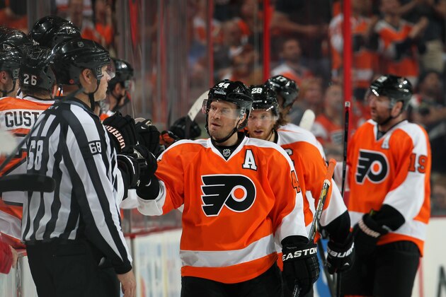 PHILADELPHIA, PA - APRIL 13: Kimmo Timonen #44 of the Philadelphia Flyers celebrates his second period power-play goal against the Carolina Hurricanes with his bench on April 13, 2014 at the Wells Fargo Center in Philadelphia, Pennsylvania.  (Photo by Len Redkoles/NHLI via Getty Images)