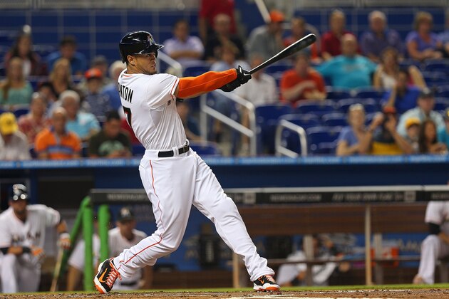 MIAMI, FL - APRIL 14: Giancarlo Stanton #27 of the Miami Marlins hits a double during a game against the Washington Nationals at Marlins Park on April 14, 2014 in Miami, Florida. (Photo by Mike Ehrmann/Getty Images) MIAMI, FL - APRIL 14: Giancarlo Stanton #27 of the Miami Marlins hits a double during a game against the Washington Nationals at Marlins Park on April 14, 2014 in Miami, Florida. (Photo by Mike Ehrmann/Getty Images)