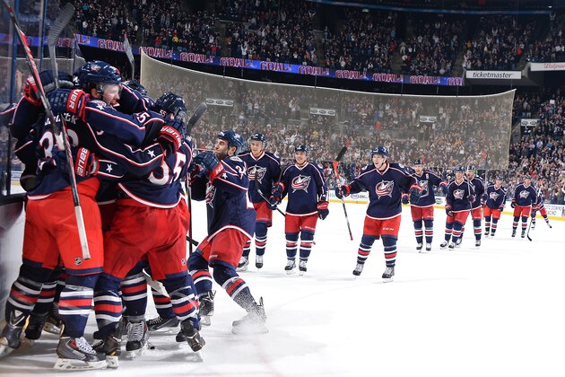 COLUMBUS, OH - APRIL 8: The Columbus Blue Jackets celebrate after defeating the Phoenix Coyotes 4-3 in overtime on April 8, 2014 at Nationwide Arena in Columbus, Ohio. (Photo by Jamie Sabau/NHLI via Getty Images)