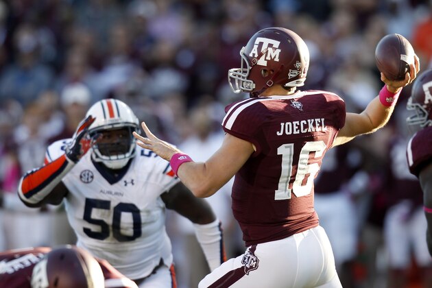 HOUSTON, TX- OCTOBER 19: Matt Joeckel #16 of the Texas A&M Aggies in the pocket while Ben Bradley #50 of the Auburn Tigers rushes on October 19, 2013 at Kyle Field in College Station, Texas. Auburn Tigers won 45 to 41.(Photo by Thomas B. Shea/Getty Images) HOUSTON, TX- OCTOBER 19: Matt Joeckel #16 of the Texas A&M Aggies in the pocket while Ben Bradley #50 of the Auburn Tigers rushes on October 19, 2013 at Kyle Field in College Station, Texas. Auburn Tigers won 45 to 41.(Photo by Thomas B. Shea/Getty Images)