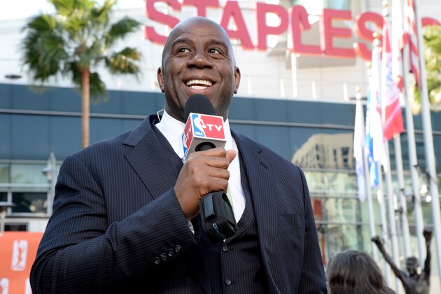 LOS ANGELES, CA - FEBRUARY 5:  Earvin 'Magic' Johnson poses for a picture during a press conference to announce his purchase of the Los Angeles Sparks at STAPLES Center on February 5, 2014 in Los Angeles, California. NOTE TO USER: User expressly acknowledges and agrees that, by downloading and/or using this Photograph, user is consenting to the terms and conditions of the Getty Images License Agreement. Mandatory Copyright Notice: Copyright 2014 NBAE (Photo by Andrew D. Bernstein/NBAE via Getty Images)