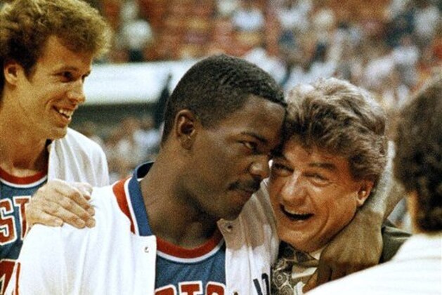 FILE - In this May 13, 1987 file photo, Detroit Pistons coach Chuck Daly hugs guard Joe Dumars after the Pistons won the second round of the NBA playoffs, defeating the Atlanta Hawks 104-96, in Atlanta. The FBI investigated a series of threatening letters sent to Daly at the height of his team's success during the 1989-90
