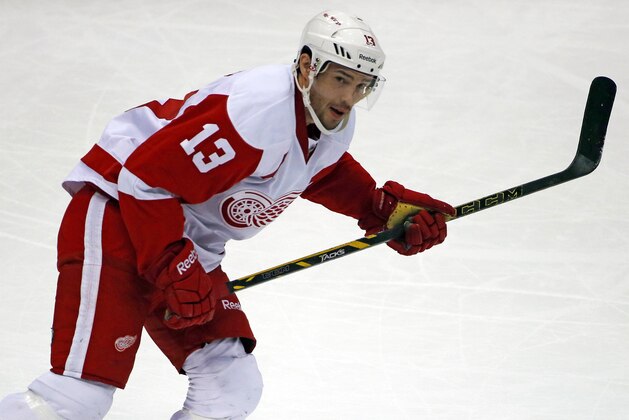 Detroit Red Wings center Pavel Datsyuk (13) skates in an NHL hockey game against the Pittsburgh Penguins in Pittsburgh, Wednesday, April 9, 2014. (AP Photo/Gene J. Puskar)
