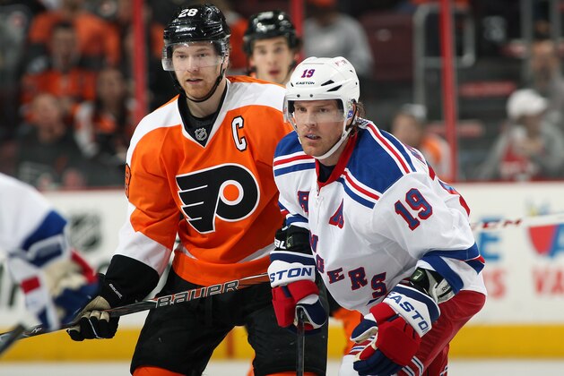 PHILADELPHIA, PA - APRIL 16:  Claude Giroux #28 of the Philadelphia Flyers faces-off against Brad Richards #19 of the New York Rangers on April 16, 2013 at the Wells Fargo Center in Philadelphia, Pennsylvania.  (Photo by Len Redkoles/NHLI via Getty Images)