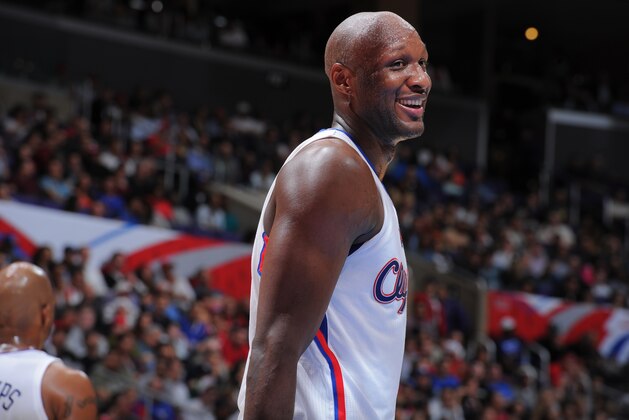 LOS ANGELES, CA - MARCH 13:  Lamar Odom #7 of the Los Angeles Clippers smiles during the game against the Memphis Grizzlies at Staples Center on March 13, 2013 in Los Angeles, California. NOTE TO USER: User expressly acknowledges and agrees that, by downloading and/or using this Photograph, user is consenting to the terms and conditions of the Getty Images License Agreement. Mandatory Copyright Notice: Copyright 2013 NBAE (Photo by Andrew D. Bernstein/NBAE via Getty Images)