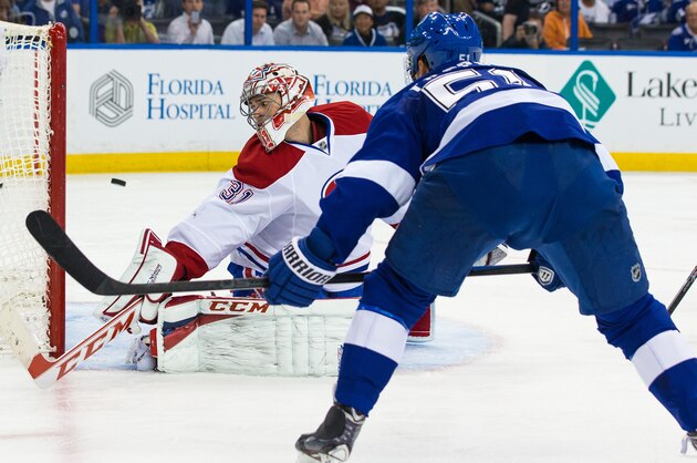 TAMPA, FL - APRIL 16:  Valtteri Filppula #51 of the Tampa Bay Lightning shoots the puck wide of the net of goalie Carey Price #31 during the third period in Game One of the First Round of the 2014 Stanley Cup Playoffs at the Tampa Bay Times Forum on April 16, 2014 in Tampa, Florida.  (Photo by Scott Audette/NHLI via Getty Images)
