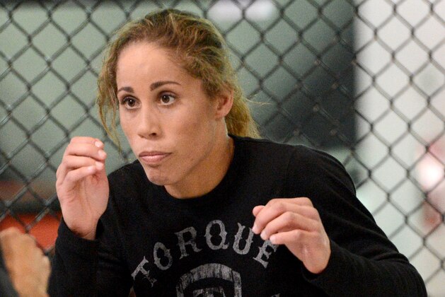 Feb 20, 2013; Torrance, CA, USA;  Liz Carmouche during today's public workout at the UFC gym in Torrance, CA. Carmouche has a bout with Ronda Rousey on Feb 23 in Anaheim, CA.  Mandatory Credit: Jayne Kamin-Oncea-USA TODAY Sports