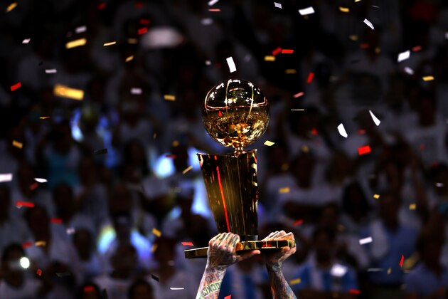 MIAMI, FL - JUNE 20:  Chris Andersen #11 of the Miami Heat holds up the Larry O'Brien Championship Trophy as the Heat celebrate after defeating the San Antonio Spurs 95-88 to win Game Seven of the 2013 NBA Finals at AmericanAirlines Arena on June 20, 2013 in Miami, Florida. NOTE TO USER: User expressly acknowledges and agrees that, by downloading and or using this photograph, User is consenting to the terms and conditions of the Getty Images License Agreement.  (Photo by Mike Ehrmann/Getty Images)