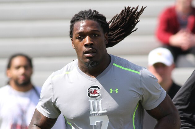 South Carolina defensive end Jadeveon Clowney competes in a drill for NFL representatives at South Carolina football pro day in Columbia, S.C., Wednesday, April 2, 2014. (AP Photo/Mary Ann Chastain)