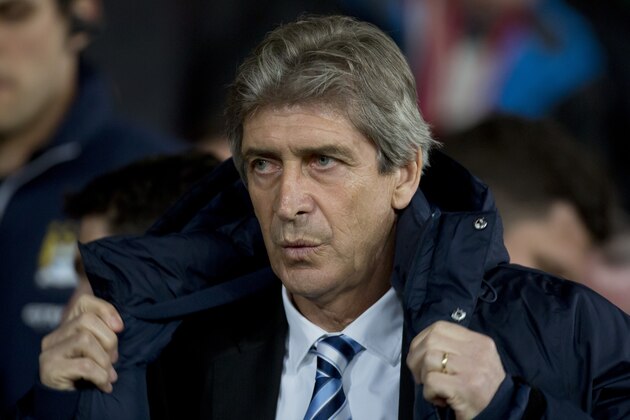 Manchester City's manager Manuel Pellegrini takes to the touchline before his team's English Premier League soccer match against Manchester United at Old Trafford Stadium, Manchester, England, Tuesday, March 25, 2014. (AP Photo/Jon Super) Manchester City's manager Manuel Pellegrini takes to the touchline before his team's English Premier League soccer match against Manchester United at Old Trafford Stadium, Manchester, England, Tuesday, March 25, 2014. (AP Photo/Jon Super)