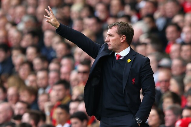 Liverpool's manager Brendan Rodgers applauds during their English Premier League soccer match against Manchester City at Anfield in Liverpool, England, Sunday April. 13, 2014. (AP Photo/Clint Hughes)