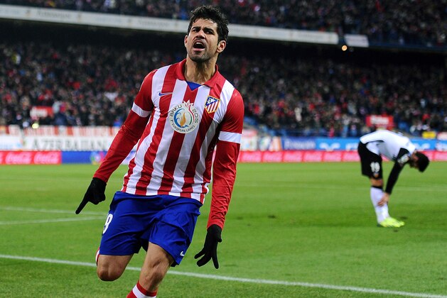 MADRID, SPAIN - DECEMBER 15:  Diego Costa of Club Atletico de Madrid celebrates after scoring Atletico's opening goal during the La Liga match between Club Atletico de Madrid and Valencia CF at Vicente Calderon Stadium on December 15, 2013 in Madrid, Spain.  (Photo by Denis Doyle/Getty Images)