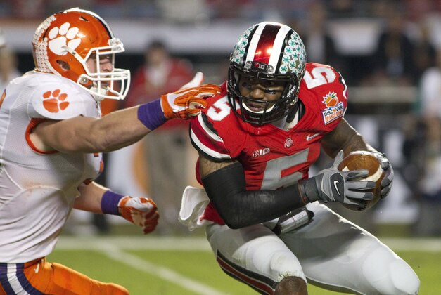 Tennessee wide receiver Marquez North (8) is tackled as he runs the ball after a catch during the annual Orange and White NCAA college spring football game on Saturday, April 12, 2014, in Knoxville, Tenn. (AP Photo/Wade Payne) Tennessee wide receiver Marquez North (8) is tackled as he runs the ball after a catch during the annual Orange and White NCAA college spring football game on Saturday, April 12, 2014, in Knoxville, Tenn. (AP Photo/Wade Payne)