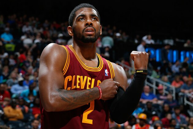 ATLANTA, GA - APRIL 04: Kyrie Irving #2 of the Cleveland Cavaliers grabs his arm after falling out of bounds with the ball against the Atlanta Hawks at Philips Arena on April 4, 2014 in Atlanta, Georgia. NOTE TO USER: User expressly acknowledges and agrees that, by downloading and or using this photograph, User is consenting to the terms and conditions of the Getty Images License Agreement. (Photo by Kevin C. Cox/Getty Images) ATLANTA, GA - APRIL 04: Kyrie Irving #2 of the Cleveland Cavaliers grabs his arm after falling out of bounds with the ball against the Atlanta Hawks at Philips Arena on April 4, 2014 in Atlanta, Georgia. NOTE TO USER: User expressly acknowledges and agrees that, by downloading and or using this photograph, User is consenting to the terms and conditions of the Getty Images License Agreement. (Photo by Kevin C. Cox/Getty Images)