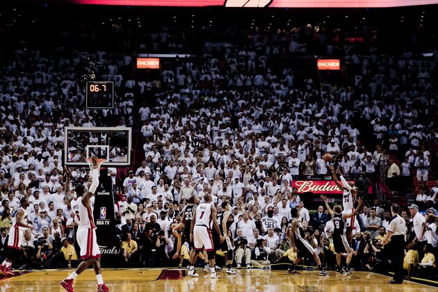 MIAMI, FL - JUNE 18: Ray Allen #34 of the Miami Heat hits a three-point shot to tie the score and send the San Antonio Spurs into overtime in Game Six of the 2013 NBA Finals on June 18, 2013 at American Airlines Arena in Miami, Florida. NOTE TO USER: User expressly acknowledges and agrees that, by downloading and or using this photograph, User is consenting to the terms and conditions of the Getty Images License Agreement. Mandatory Copyright Notice: Copyright 2013 NBAE (Photo by Nathaniel S. Butler/NBAE via Getty Images)