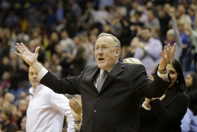 Minnesota Timberwolves head coach Rick Adelman questions a call during overtime of an NBA basketball game against the Utah Jazz in Minneapolis, Wednesday, April 16, 2014. The Jazz won 136-130 in double overtime. (AP Photo/Ann Heisenfelt)