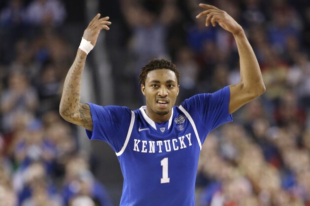 Kentucky guard James Young celebrates during the second half of an NCAA Final Four tournament college basketball semifinal game against Wisconsin Saturday, April 5, 2014, in Arlington, Texas. (AP Photo/David J. Phillip)