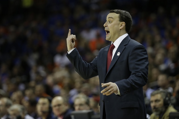 Dayton head coach Archie Miller speaks to an official during the first half in a regional final game against Florida at the NCAA college basketball tournament, Saturday, March 29, 2014, in Memphis, Tenn. (AP Photo/Mark Humphrey)