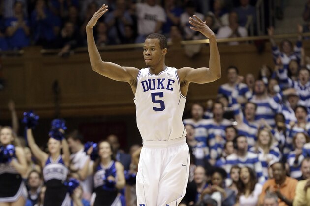 Duke's Rodney Hood reacts following a basket against North Carolina during the second half of an NCAA college basketball game in Durham, N.C., Saturday, March 8, 2014. Duke won 93-81. (AP Photo/Gerry Broome)