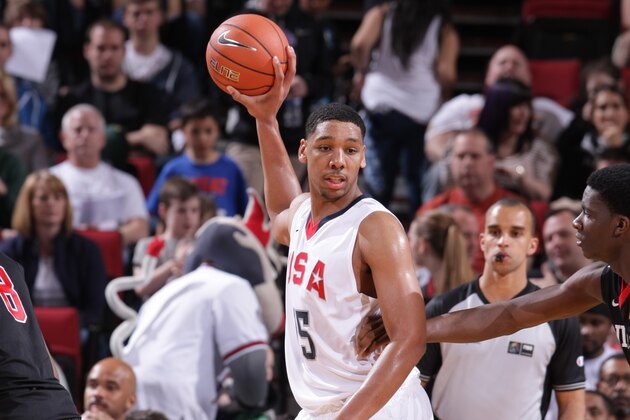 PORTLAND, OR - APRIL 12:  Jahlil Okafor #15 of Team USA looks to pass the ball during the game against the World Team on April 12, 2014 at the Moda Center Arena in Portland, Oregon. NOTE TO USER: User expressly acknowledges and agrees that, by downloading and or using this photograph, user is consenting to the terms and conditions of the Getty Images License Agreement. Mandatory Copyright Notice: Copyright 2014 NBAE (Photo by Sam Forencich/NBAE via Getty Images)