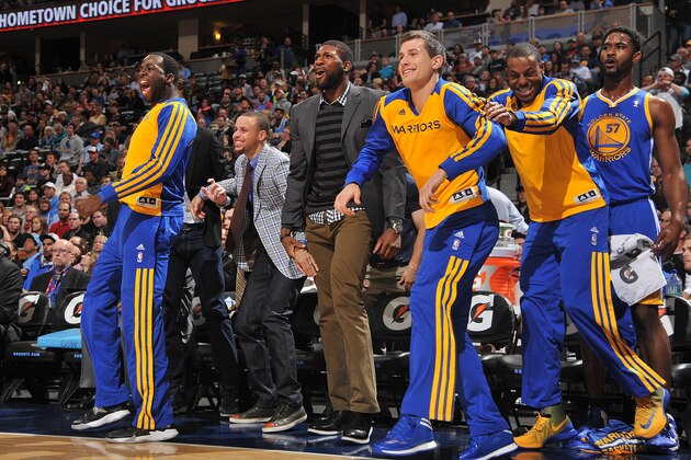 DENVER, CO - April 16:  David Lee #10, Stephen Curry #30 of the Golden State Warriors reacts to a call against the Denver Nuggets on April 16, 2014 at the Pepsi Center in Denver, Colorado. NOTE TO USER: User expressly acknowledges and agrees that, by downloading and/or using this Photograph, user is consenting to the terms and conditions of the Getty Images License Agreement. Mandatory Copyright Notice: Copyright 2014 NBAE (Photo by Bart Young/NBAE via Getty Images)