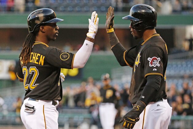 Pittsburgh Pirates' Andrew McCutchen (22) is greeted by teammate Starling Marte as he crosses home plate after hitting a two-run home run off Milwaukee Brewers starting pitcher Yovani Gallardo during the first inning of a baseball game in Pittsburgh, Thursday, April 17, 2014. (AP Photo/Gene J. Puskar) Pittsburgh Pirates' Andrew McCutchen (22) is greeted by teammate Starling Marte as he crosses home plate after hitting a two-run home run off Milwaukee Brewers starting pitcher Yovani Gallardo during the first inning of a baseball game in Pittsburgh, Thursday, April 17, 2014. (AP Photo/Gene J. Puskar)