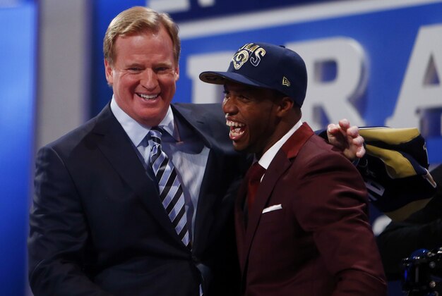 Apr 25, 2013; New York, NY, USA; Tavon Austin (West Virginia) is introduced by NFL commissioner Roger Goodell as the number eight overall pick to the St. Louis Rams during the 2013 NFL Draft at Radio City Music Hall. Mandatory Credit: Jerry Lai-USA TODAY Sports