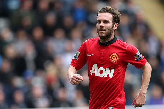 Manchester United's Juan Mata during their English Premier League soccer match against Newcastle United at St James' Park, Newcastle, England, Saturday, April 5, 2014. (AP Photo/Scott Heppell)