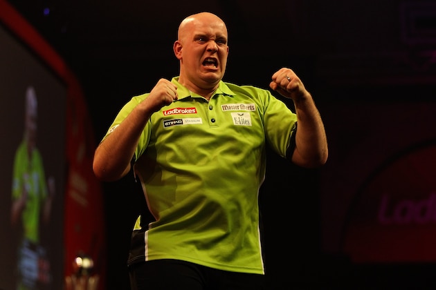 LONDON, ENGLAND - JANUARY 01:  Michael van Gerwen celebrates defeating Peter Wright of Scotland and winning the final of the Ladbrokes.com World Darts Championships at Alexandra Palace on January 1, 2014 in London, England.  (Photo by Ben Hoskins/Getty Images)