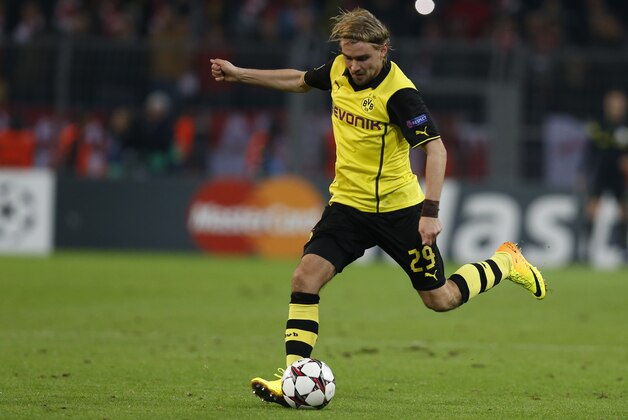 Dortmund's Marcel Schmelzer during the Champions League group F soccer match between Borussia Dortmund and Arsenal FC in Dortmund, Germany, Wednesday,Nov.6,2013. (AP Photo/Frank Augstein)