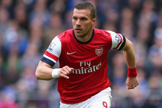 LIVERPOOL, ENGLAND - APRIL 06:  Lukas Podolski of Arsenal in action during the Barclays Premier League match between Everton and Arsenal at Goodison Park on April 6, 2014 in Liverpool, England.  (Photo by Alex Livesey/Getty Images)