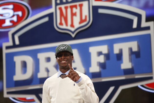 RAW FILE - Geno Smith, a quarterback from West Virginia gestures after being selected 39th overall by the New York Jets in the second round of the NFL Draft, Friday, April 26, 2013 at Radio City Music Hall in New York., Friday, April 26, 2013 at Radio City Music Hall in New York. (AP Photo/Jason DeCrow)