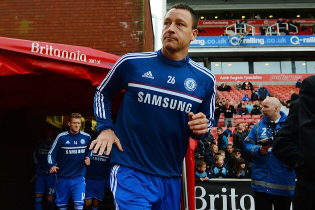 STOKE ON TRENT, ENGLAND - DECEMBER 07:  Chelsea captain John Terry leads out his players for the pre match warm up priior to kickoff during the Barclays Premier League match between Stoke City and Chelsea at Britannia Stadium on December 7, 2013 in Stoke on Trent, England.  (Photo by Michael Regan/Getty Images)