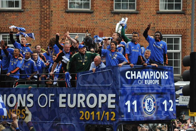 LONDON, ENGLAND - MAY 20:  The Chelsea team celebrate from an open top bus during the Chelsea victory parade following their UEFA Champions League and FA Cup victories on May 20, 2012 in London, England. (Photo by Steve Bardens/Getty Images)