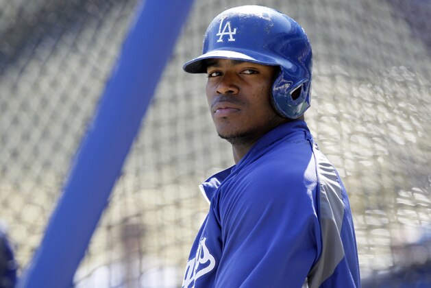Los Angeles Dodgers' Yasiel Puig warms up at the batting cage prior to a baseball game against the San Francisco Giants on Saturday, April 5, 2014, in Los Angeles. (AP Photo/Alex Gallardo) Los Angeles Dodgers' Yasiel Puig warms up at the batting cage prior to a baseball game against the San Francisco Giants on Saturday, April 5, 2014, in Los Angeles. (AP Photo/Alex Gallardo)
