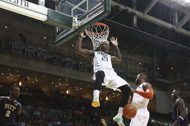 Miami's Erik Swoope reacts after scoring two points against Pittsburgh during the second half of an NCAA college basketball game in Coral Gables, Fla., Wednesday, Feb. 5, 2014. Pittsburgh won 59-55 in overtime. (AP Photo/J Pat Carter)
