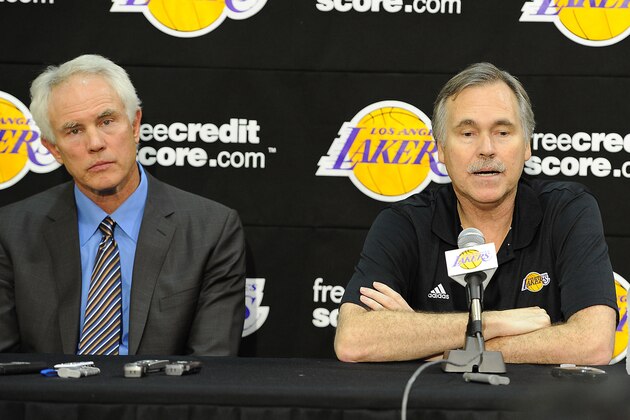 November 15, 2012; El Segundo, CA, USA;    Los Angeles Lakers general manager Mitch Kupchak (left) sits next to new head coach Mike D'Antoni during a press conference at the training facility in El Segundo.  Mandatory Credit: Jayne Kamin-Oncea-USA TODAY Sports