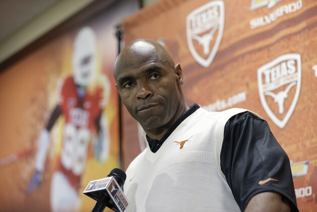 New Texas football coach Charlie Strong talks about his recruiting class during a news conference, Wednesday, Feb. 5, 2014, in Austin, Texas. Strong only had a month to scramble to keep the Longhorns recruiting class together. (AP Photo/Eric Gay)