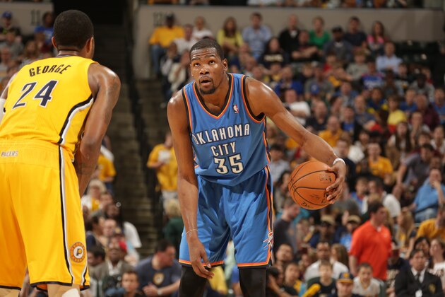 INDIANAPOLIS - APRIL 13: Kevin Durant #35 of the Oklahoma City Thunder handles the ball against the Indiana Pacers at Bankers Life Fieldhouse on April 13, 2014 in Indianapolis, Indiana.  NOTE TO USER: User expressly acknowledges and agrees that, by downloading and or using this Photograph, user is consenting to the terms and condition of the Getty Images License Agreement. Mandatory Copyright Notice: 2014 NBAE  (Photo by Ron Hoskins/NBAE via Getty Images)