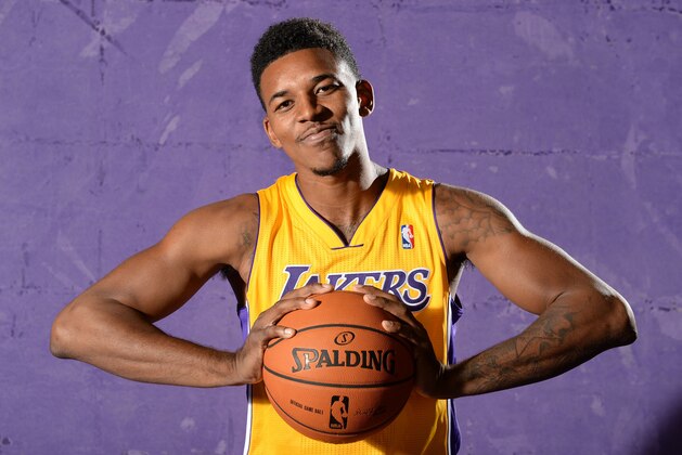 EL SEGUNDO, CA - SEPTEMBER 28:  Nick Young #0 of the Los Angeles Lakers poses for a picture during media day at Toyota Sports Center on September 28, 2013 in El Segundo, California. NOTE TO USER: User expressly acknowledges and agrees that, by downloading and/or using this Photograph, user is consenting to the terms and conditions of the Getty Images License Agreement. Mandatory Copyright Notice: Copyright 2013 NBAE (Photo by Aaron Poole/NBAE via Getty Images)